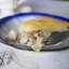 Расплющенный торт из риса с мясной начинкой