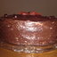 Бисквитный шоколадный торт с ванильно шоколадным кремом залитый ганашом